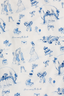 A woman modeling a short sleeve and short pajama set with a white and blue Happily Ever After print.