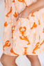 Dress with orange lobster pattern on a plain background